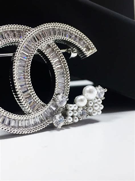 why are chanel brooches so expensive|Chanel bracelet authenticity.